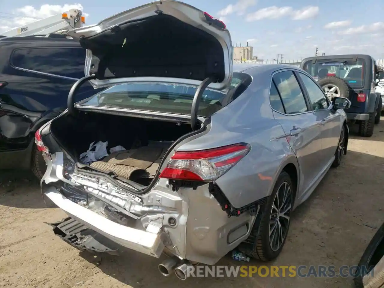 4 Photograph of a damaged car 4T1B11HK0KU787881 TOYOTA CAMRY 2019