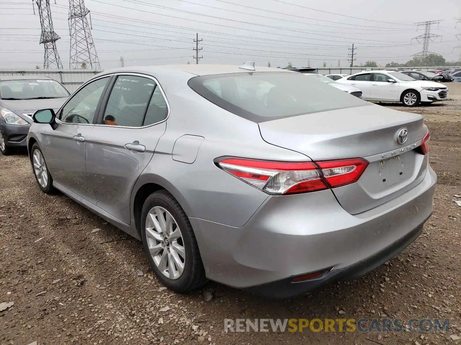 3 Photograph of a damaged car 4T1B11HK0KU788514 TOYOTA CAMRY 2019