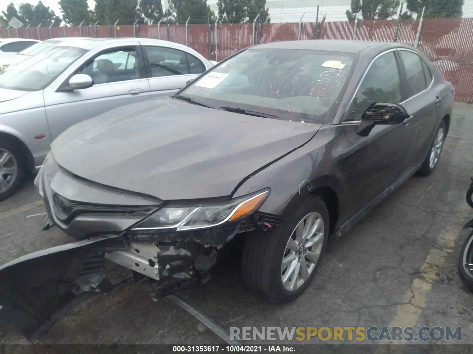 2 Photograph of a damaged car 4T1B11HK0KU788559 TOYOTA CAMRY 2019