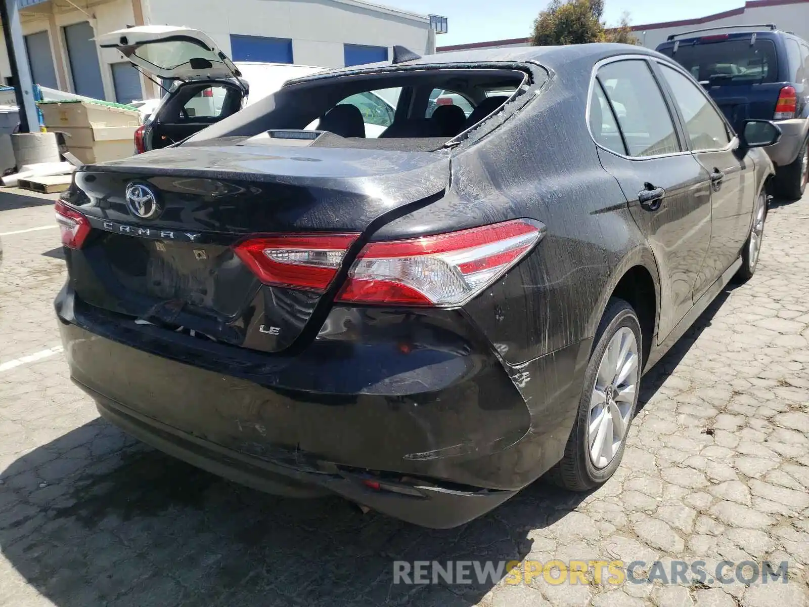 4 Photograph of a damaged car 4T1B11HK0KU788853 TOYOTA CAMRY 2019