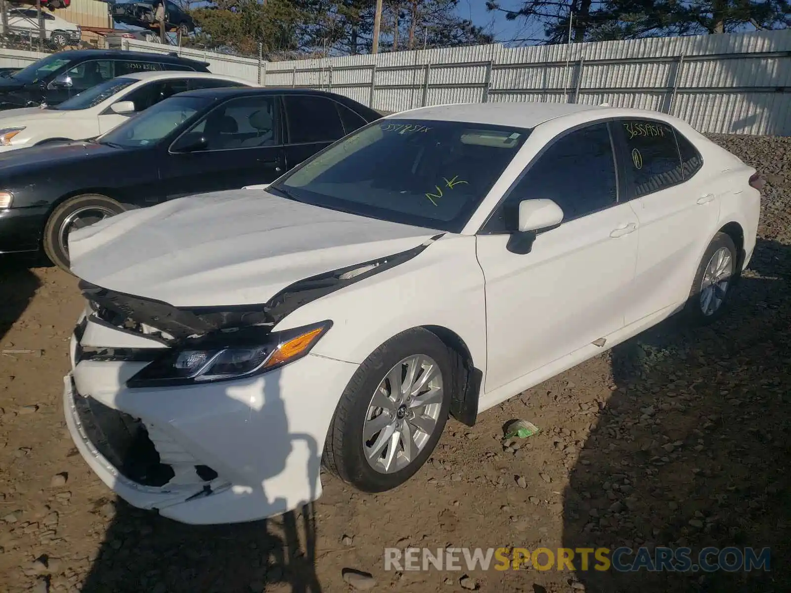 2 Photograph of a damaged car 4T1B11HK0KU789517 TOYOTA CAMRY 2019