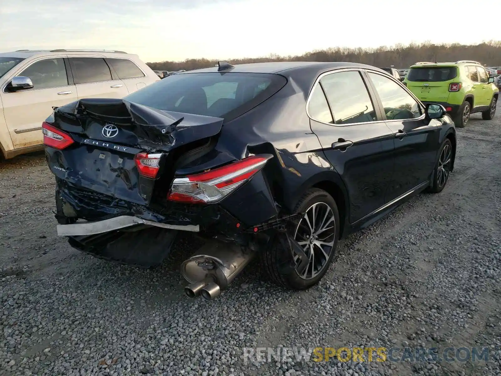 4 Photograph of a damaged car 4T1B11HK0KU789565 TOYOTA CAMRY 2019