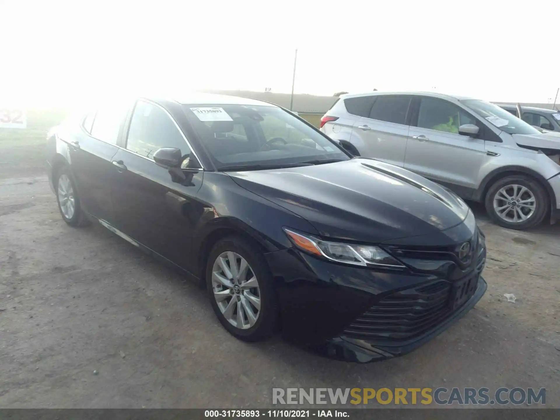 1 Photograph of a damaged car 4T1B11HK0KU789713 TOYOTA CAMRY 2019