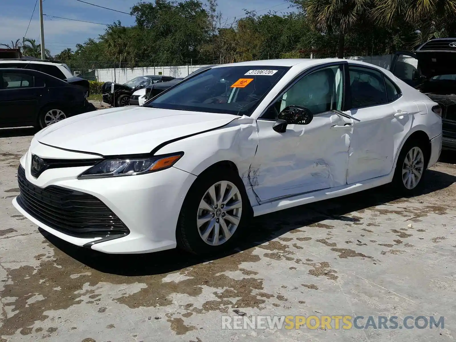 2 Photograph of a damaged car 4T1B11HK0KU792790 TOYOTA CAMRY 2019