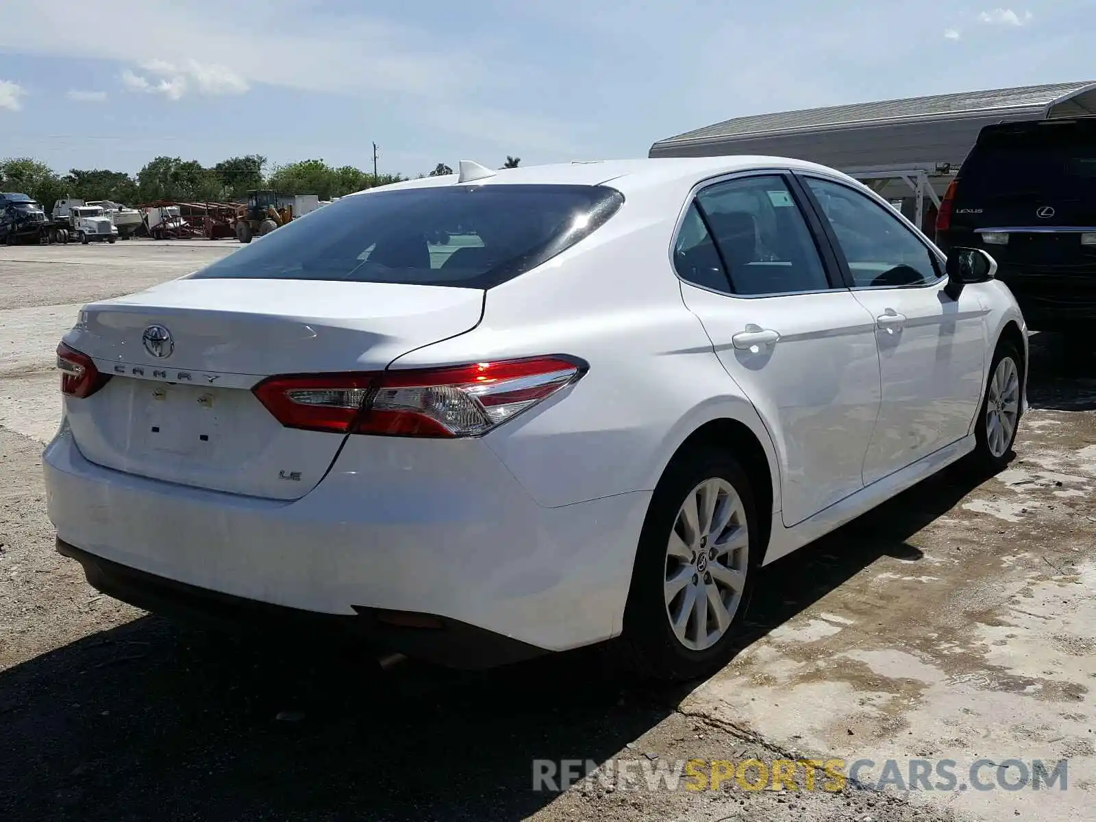 4 Photograph of a damaged car 4T1B11HK0KU792790 TOYOTA CAMRY 2019