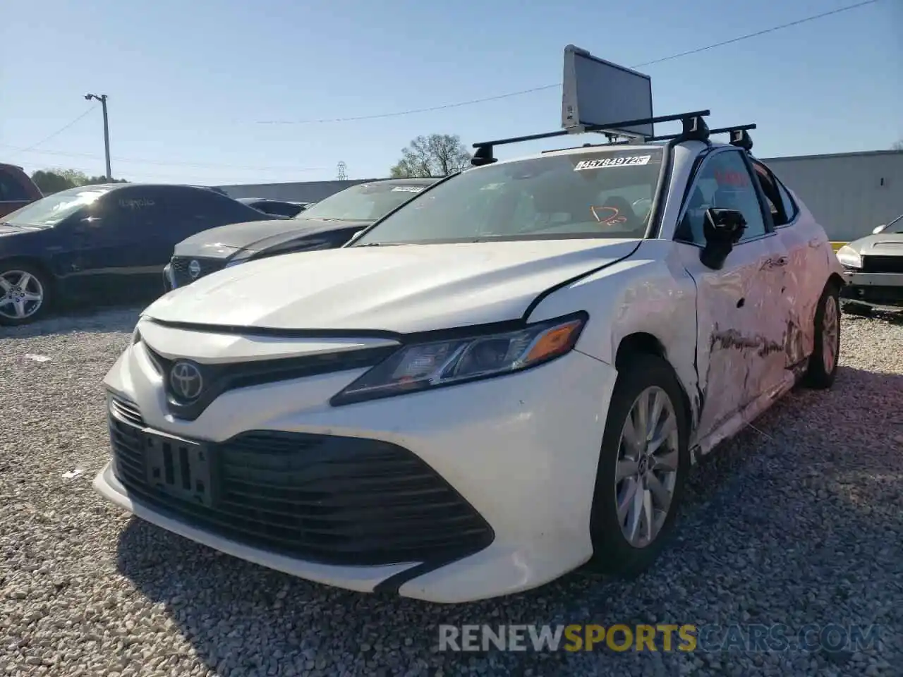 2 Photograph of a damaged car 4T1B11HK0KU793289 TOYOTA CAMRY 2019