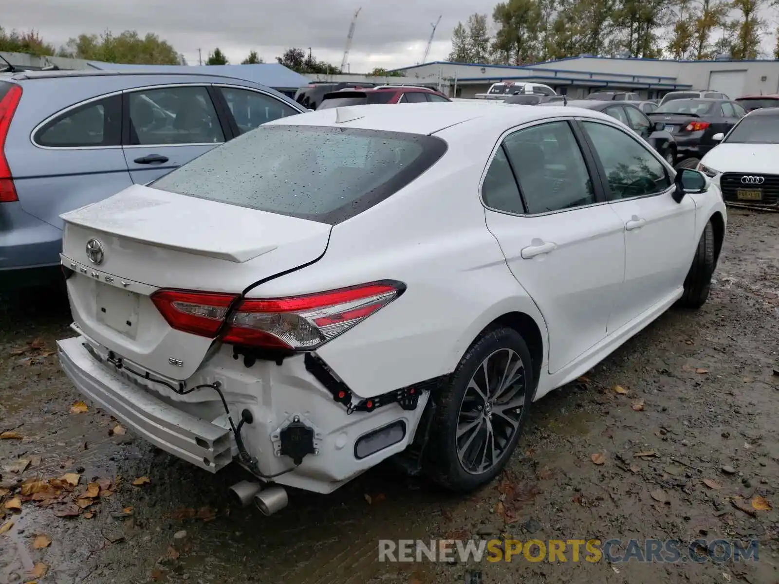 4 Photograph of a damaged car 4T1B11HK0KU793924 TOYOTA CAMRY 2019