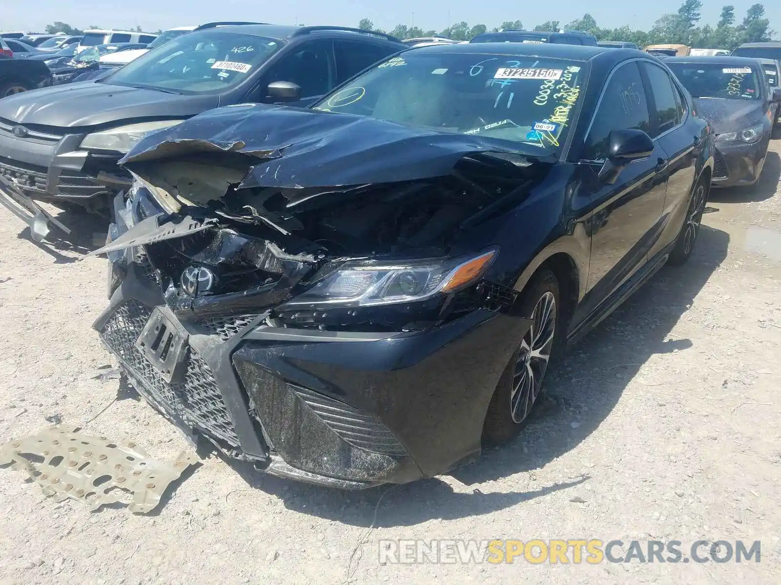 2 Photograph of a damaged car 4T1B11HK0KU796192 TOYOTA CAMRY 2019