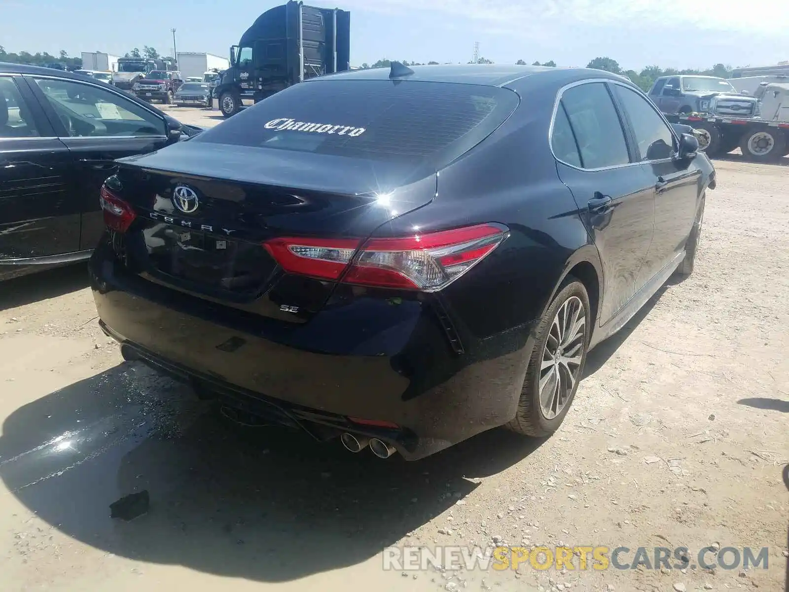 4 Photograph of a damaged car 4T1B11HK0KU796192 TOYOTA CAMRY 2019