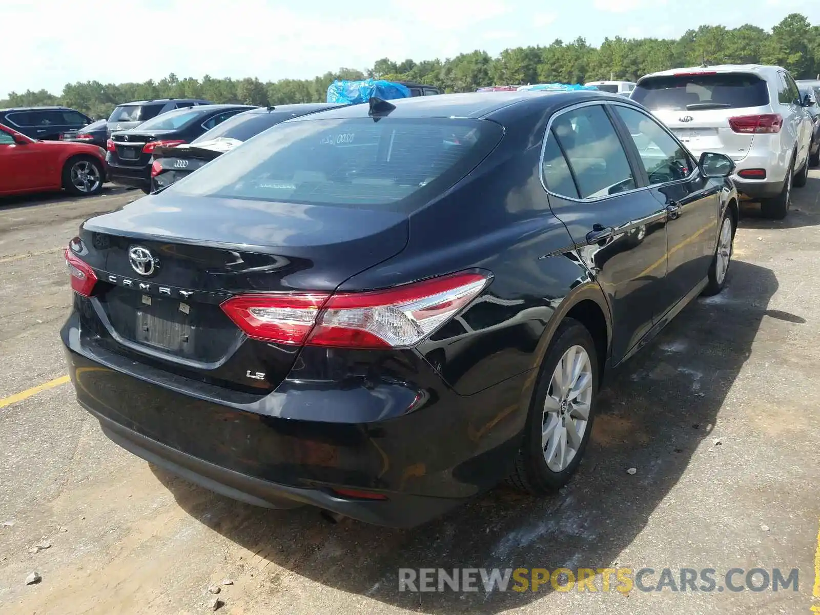 4 Photograph of a damaged car 4T1B11HK0KU796905 TOYOTA CAMRY 2019