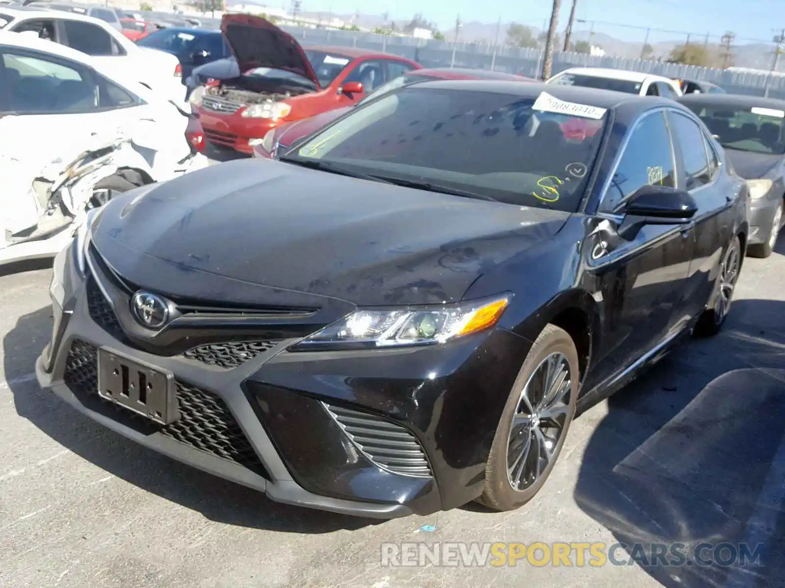 2 Photograph of a damaged car 4T1B11HK0KU797892 TOYOTA CAMRY 2019