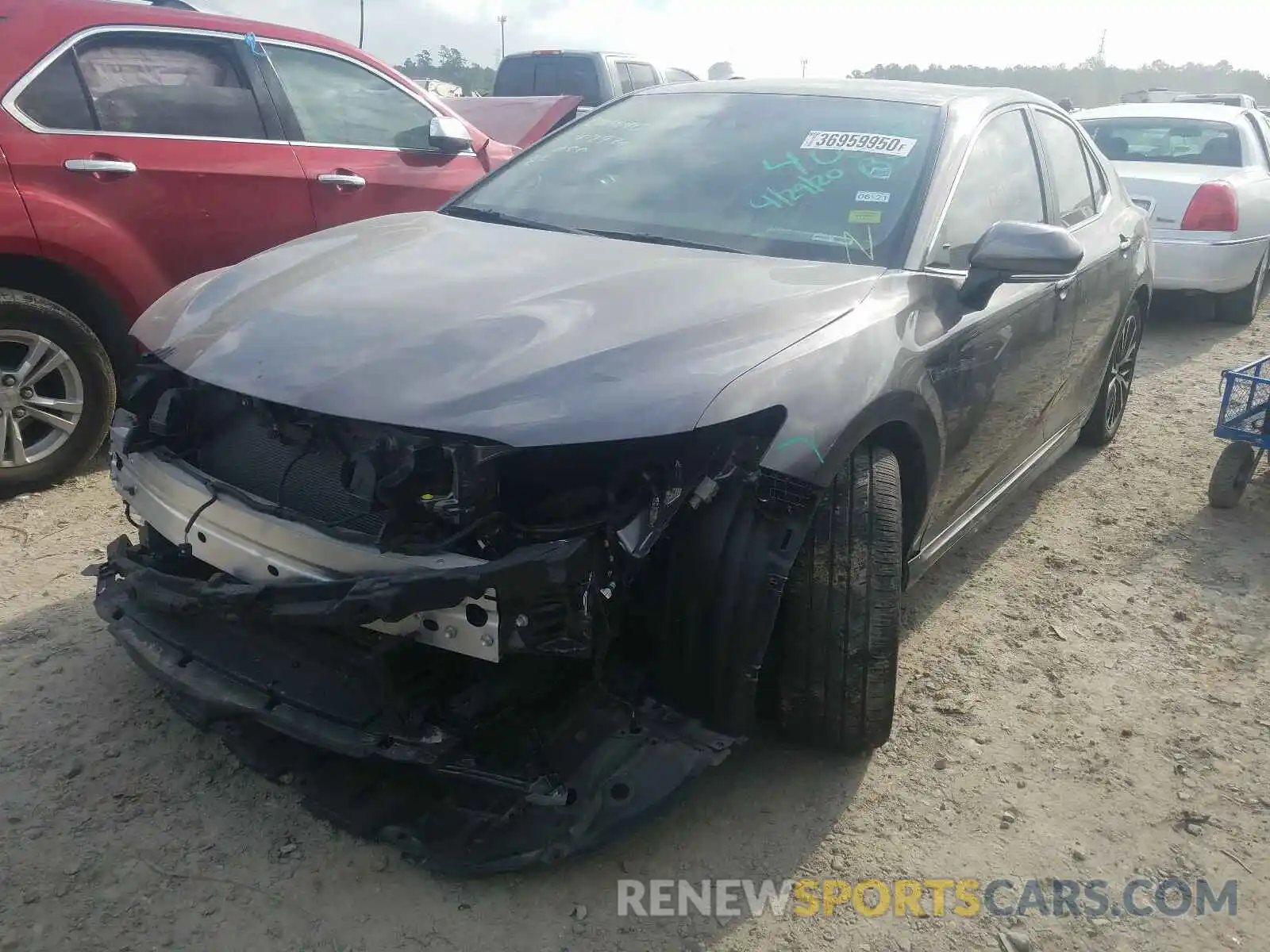 2 Photograph of a damaged car 4T1B11HK0KU798802 TOYOTA CAMRY 2019