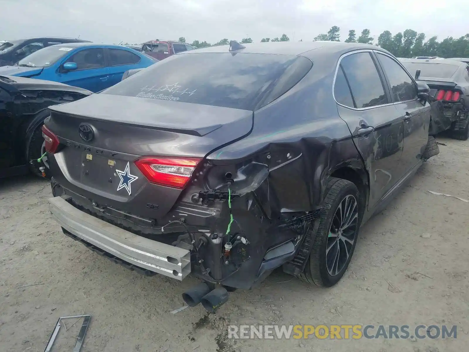 4 Photograph of a damaged car 4T1B11HK0KU798802 TOYOTA CAMRY 2019