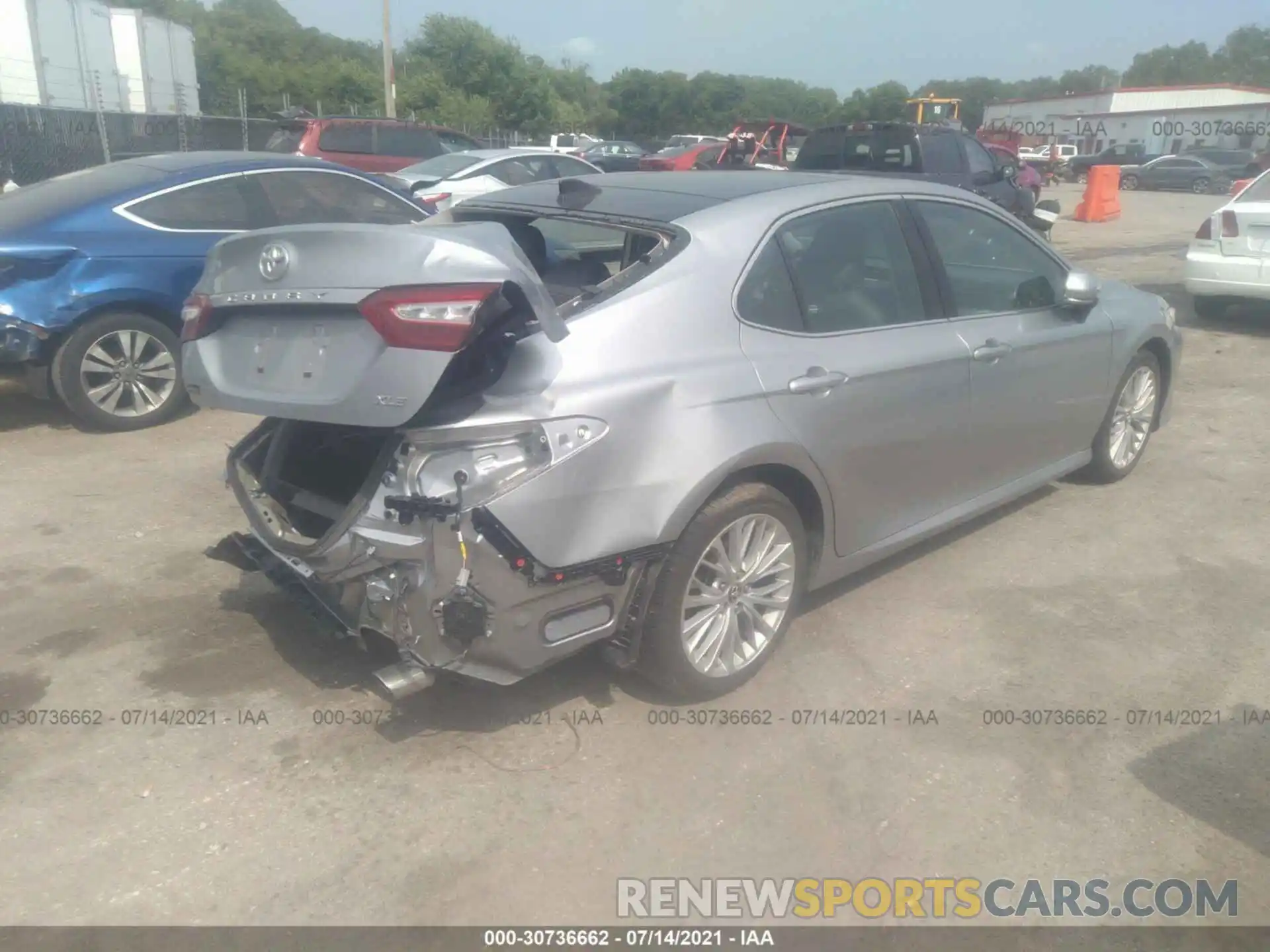 4 Photograph of a damaged car 4T1B11HK0KU800273 TOYOTA CAMRY 2019