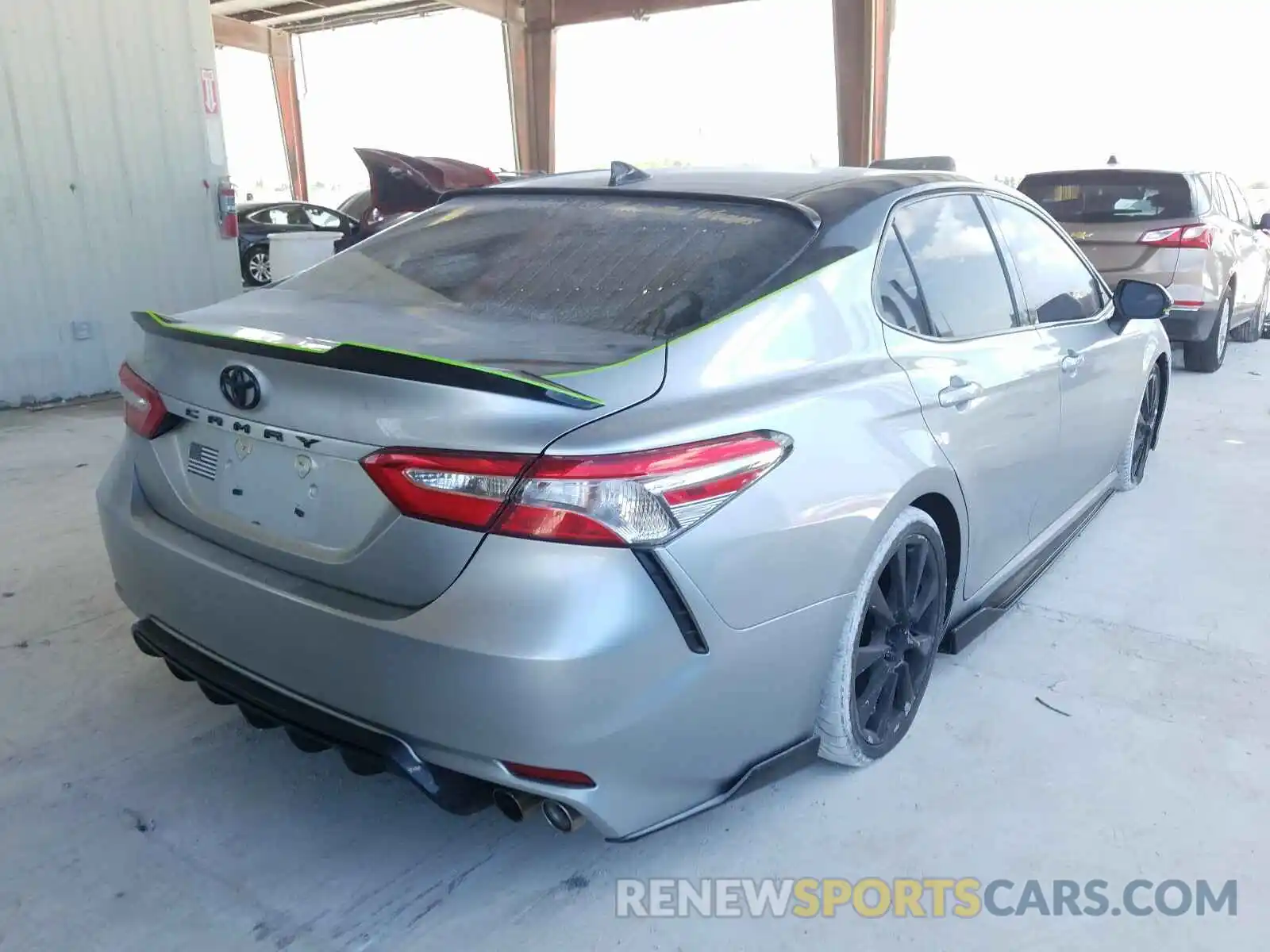 4 Photograph of a damaged car 4T1B11HK0KU801312 TOYOTA CAMRY 2019