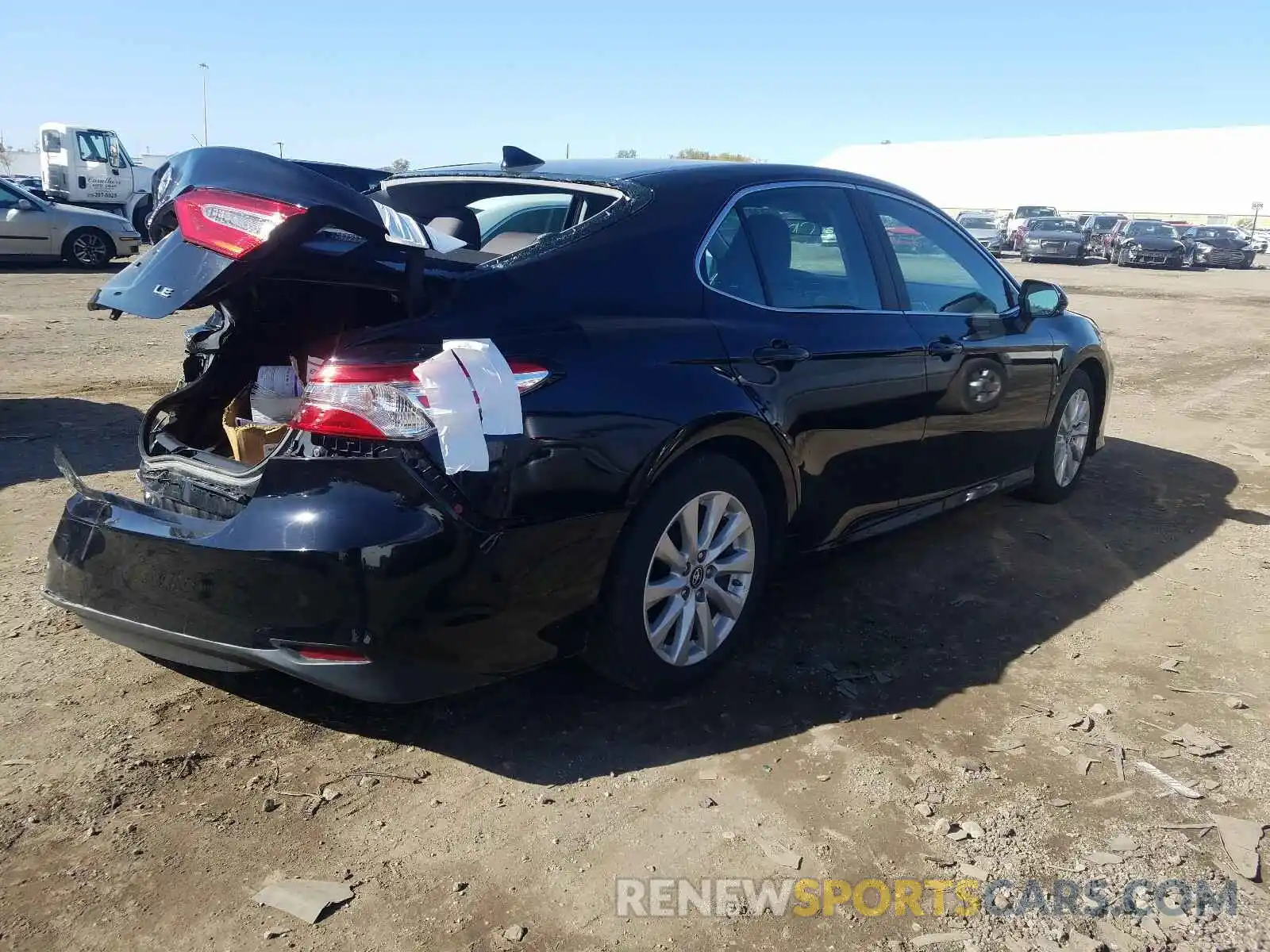 4 Photograph of a damaged car 4T1B11HK0KU802086 TOYOTA CAMRY 2019