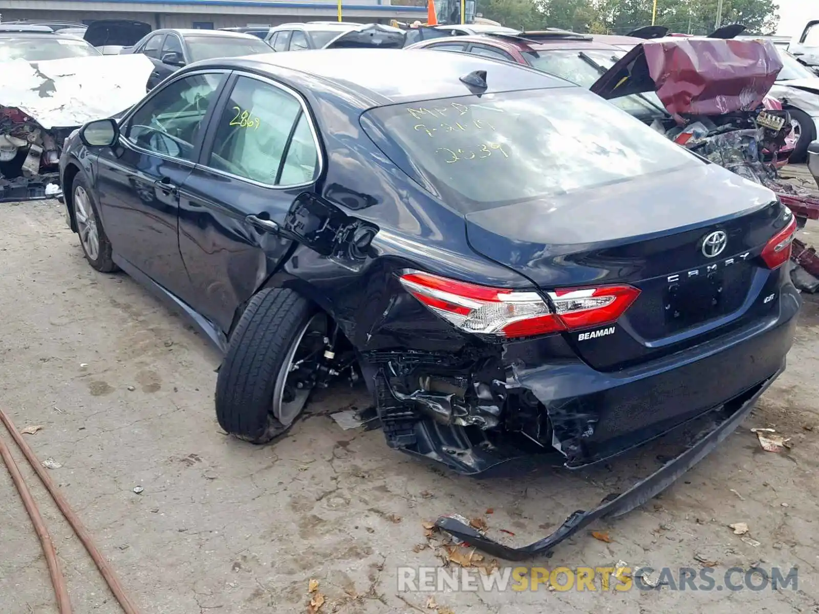 3 Photograph of a damaged car 4T1B11HK0KU802539 TOYOTA CAMRY 2019