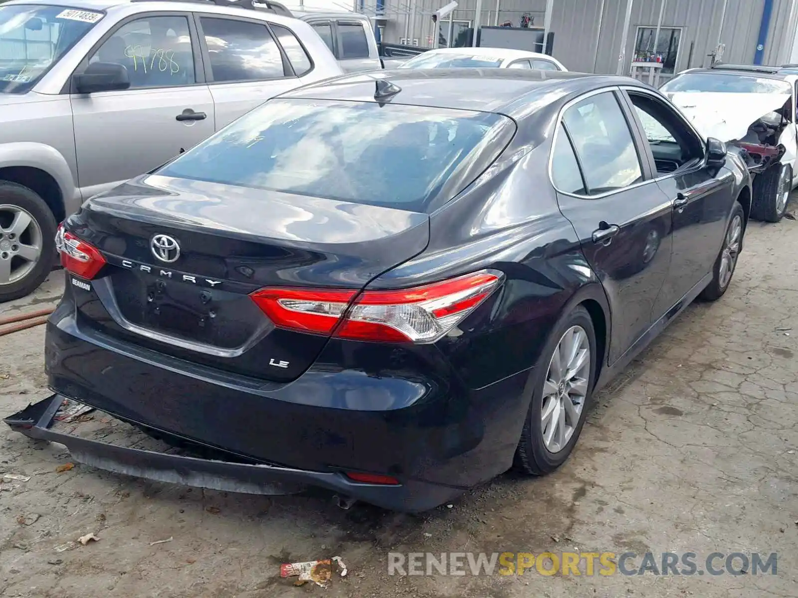 4 Photograph of a damaged car 4T1B11HK0KU802539 TOYOTA CAMRY 2019