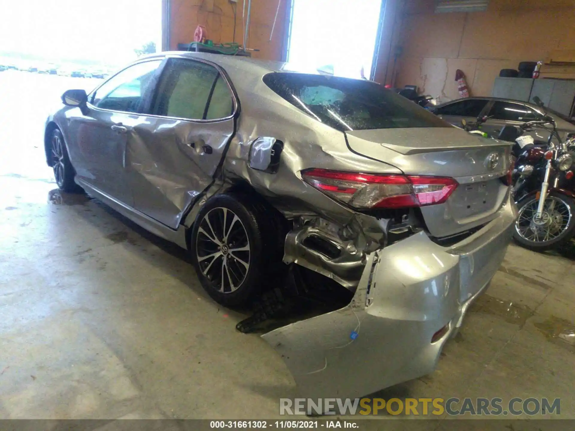 3 Photograph of a damaged car 4T1B11HK0KU803125 TOYOTA CAMRY 2019