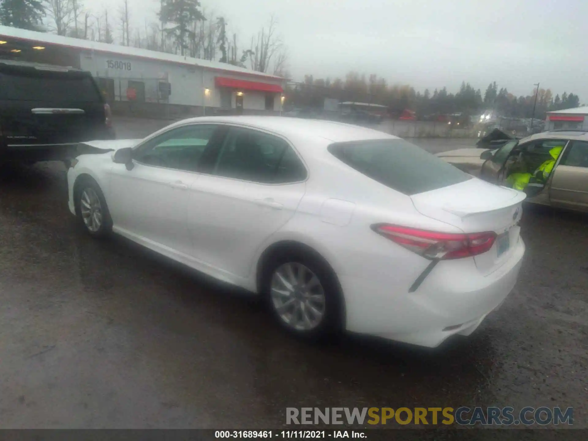 3 Photograph of a damaged car 4T1B11HK0KU803304 TOYOTA CAMRY 2019