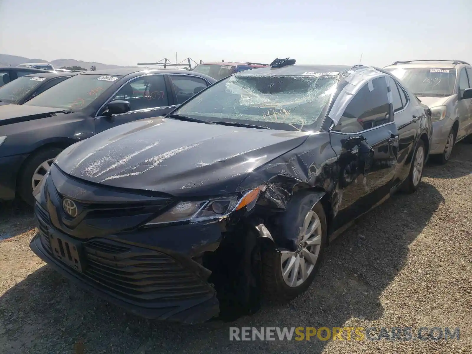 2 Photograph of a damaged car 4T1B11HK0KU805084 TOYOTA CAMRY 2019