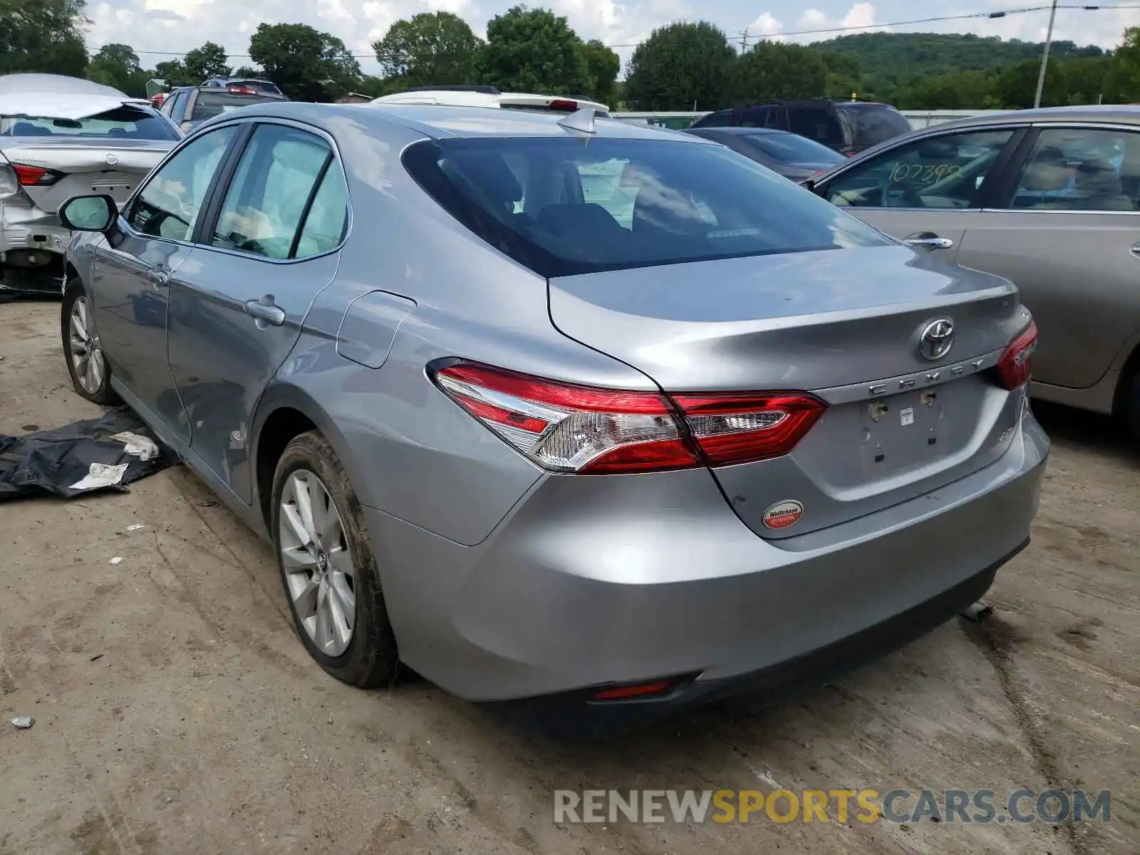 3 Photograph of a damaged car 4T1B11HK0KU806509 TOYOTA CAMRY 2019