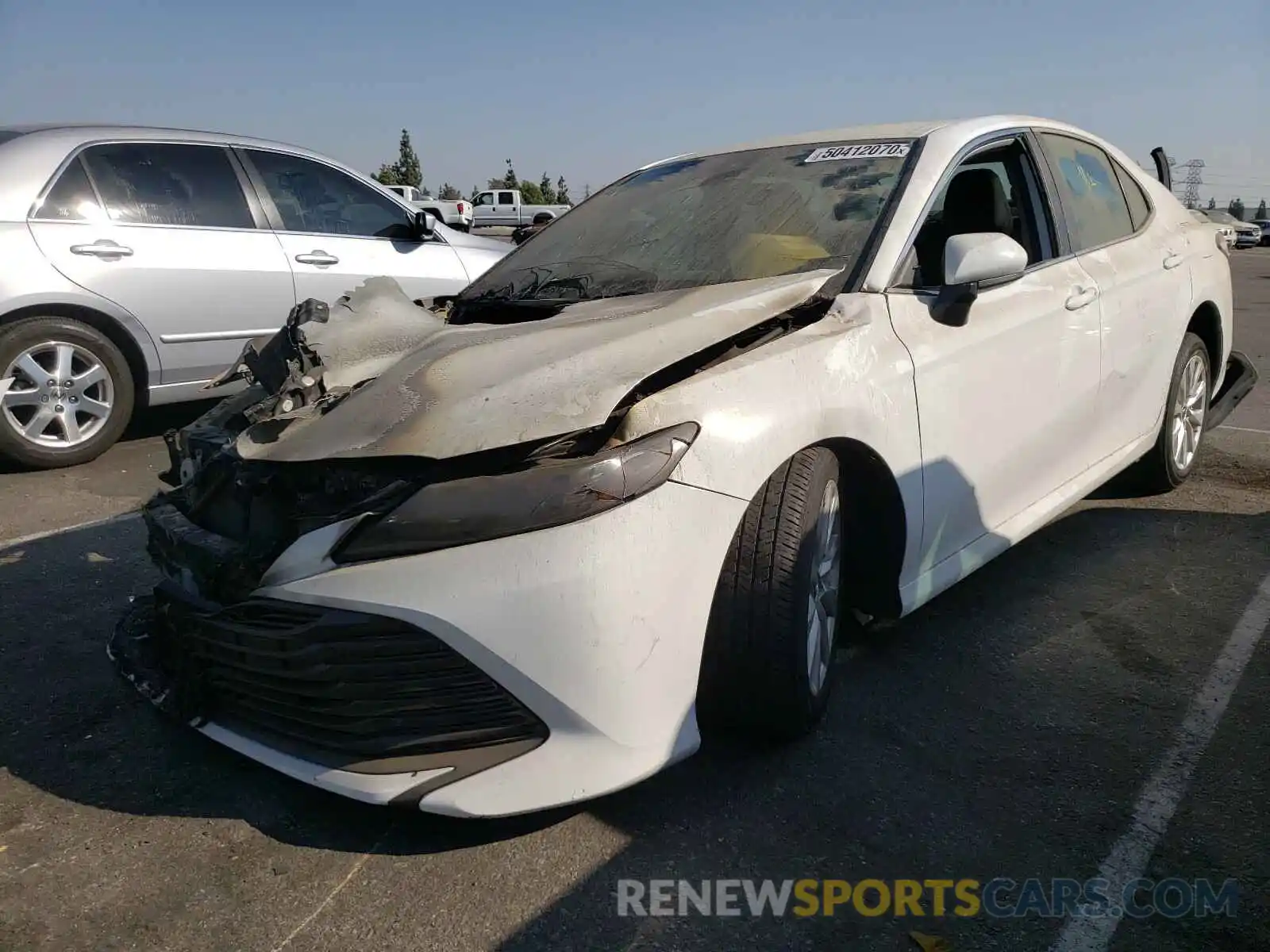 2 Photograph of a damaged car 4T1B11HK0KU807594 TOYOTA CAMRY 2019