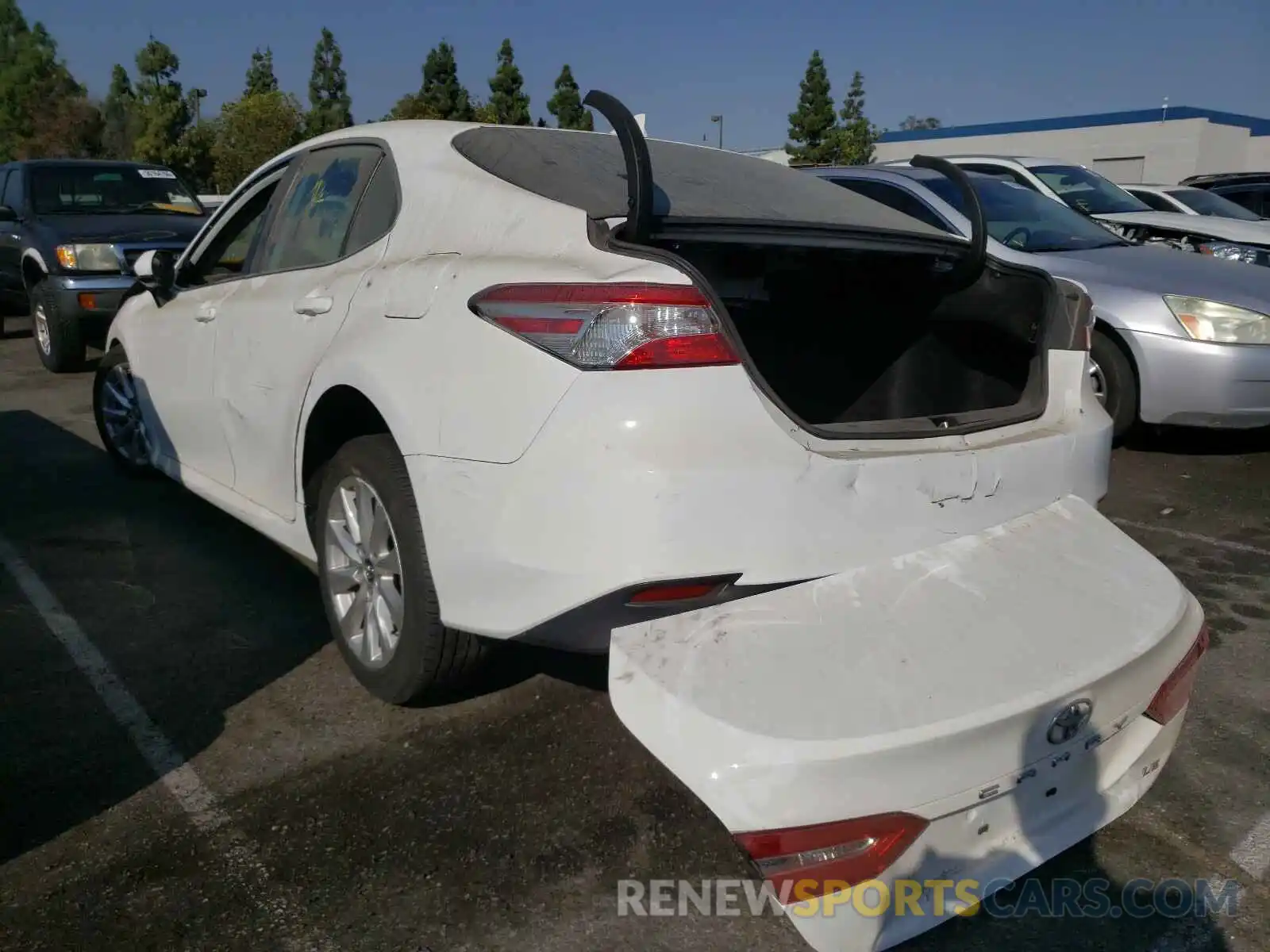 3 Photograph of a damaged car 4T1B11HK0KU807594 TOYOTA CAMRY 2019