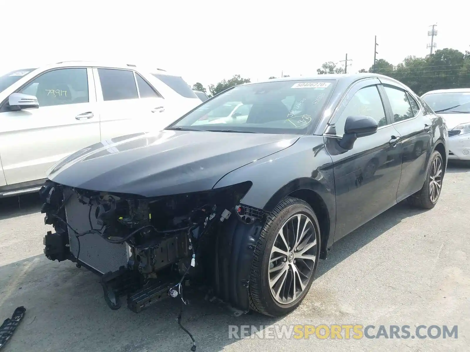 2 Photograph of a damaged car 4T1B11HK0KU814576 TOYOTA CAMRY 2019