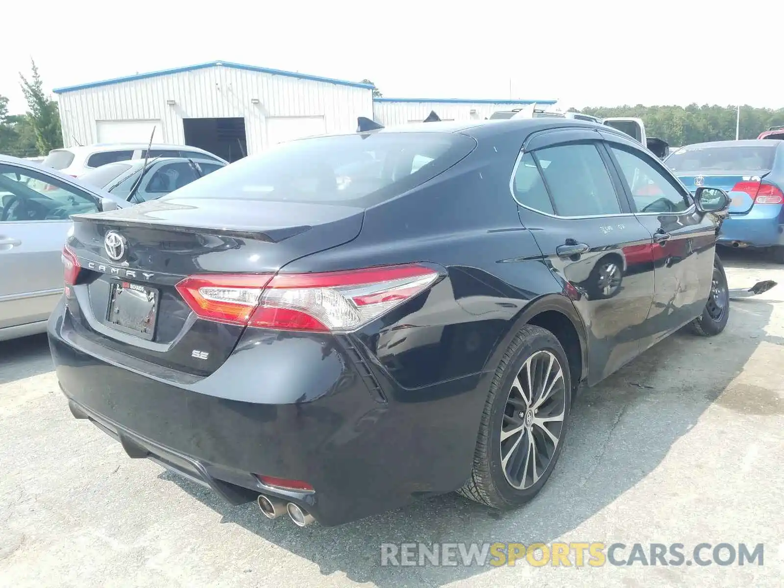 4 Photograph of a damaged car 4T1B11HK0KU814576 TOYOTA CAMRY 2019