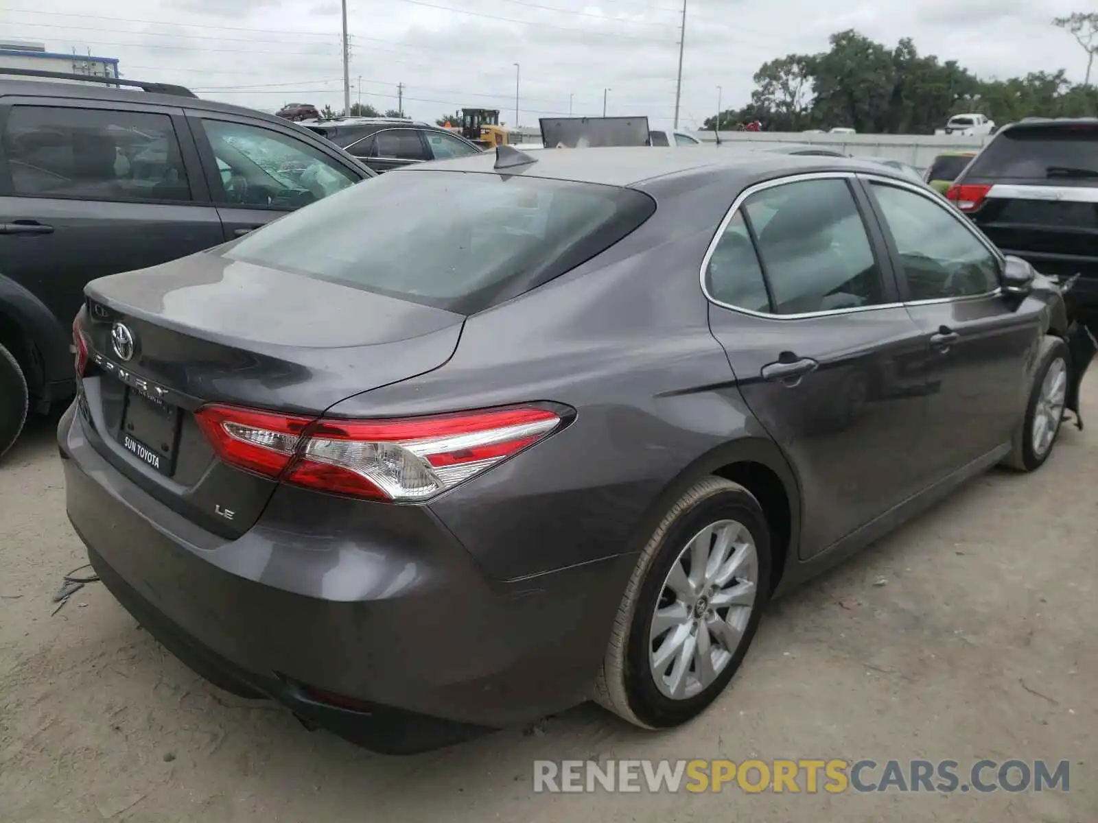 4 Photograph of a damaged car 4T1B11HK0KU815288 TOYOTA CAMRY 2019