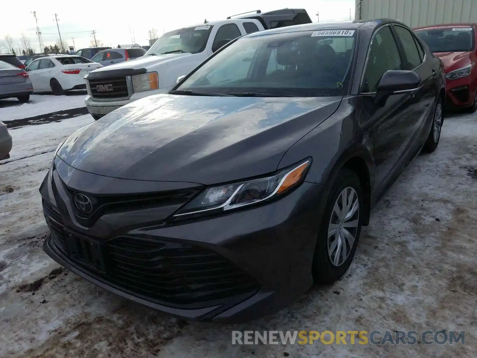 2 Photograph of a damaged car 4T1B11HK0KU815355 TOYOTA CAMRY 2019