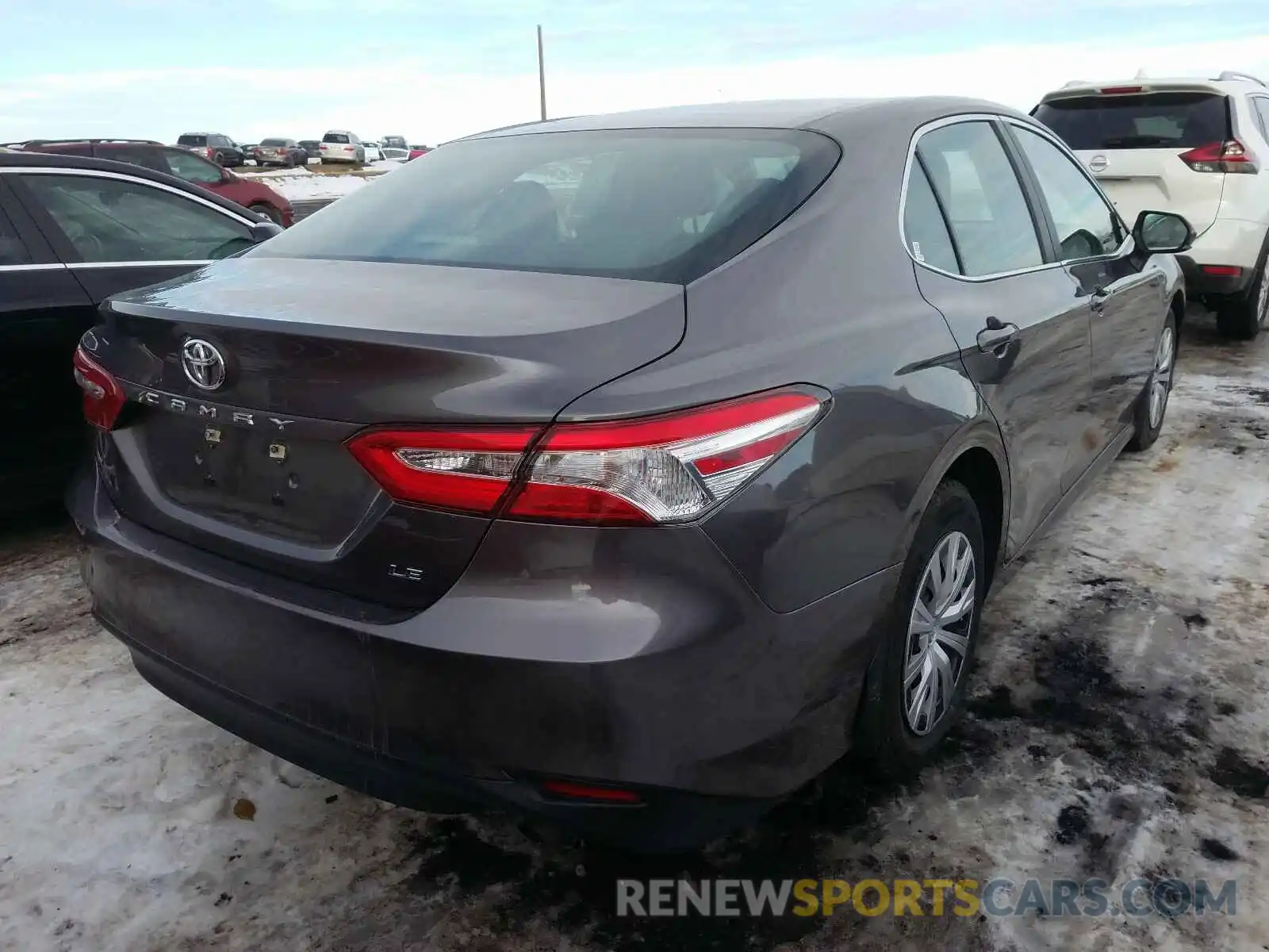 4 Photograph of a damaged car 4T1B11HK0KU815355 TOYOTA CAMRY 2019