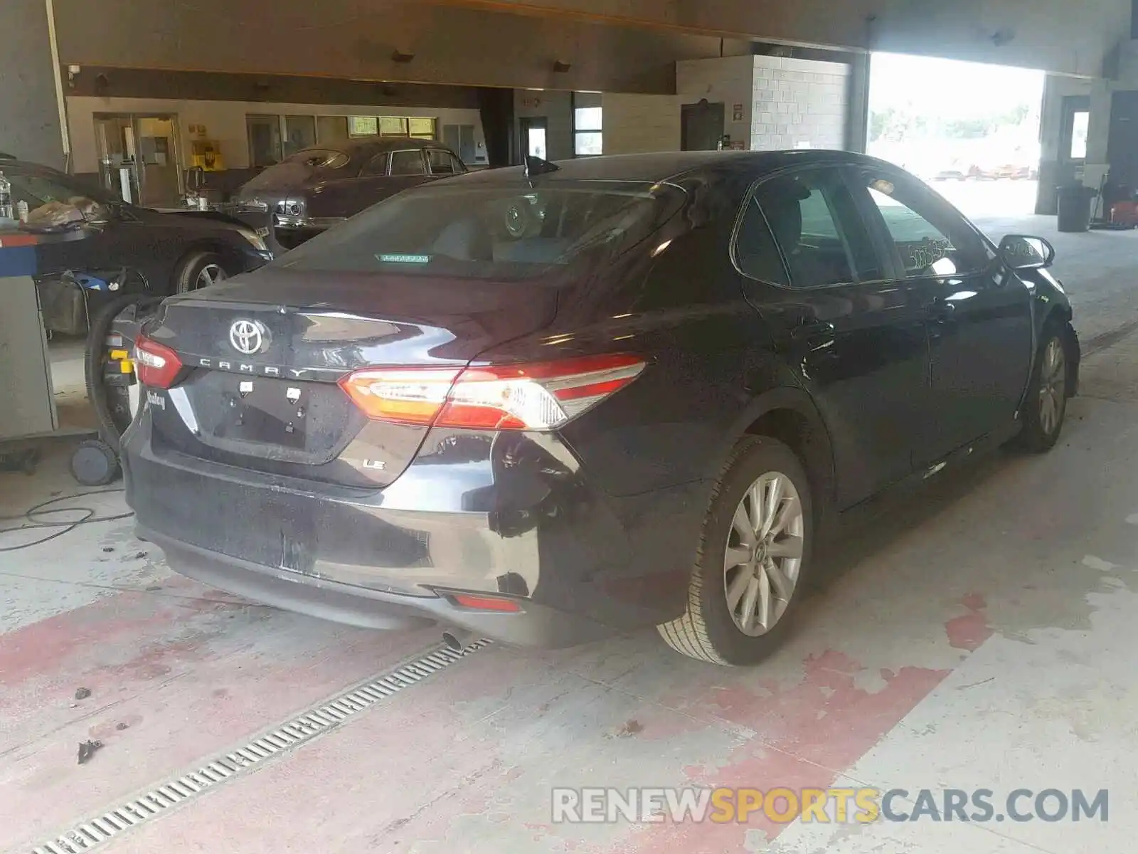 4 Photograph of a damaged car 4T1B11HK0KU816246 TOYOTA CAMRY 2019