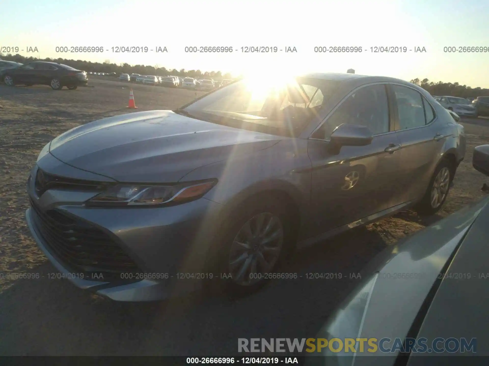 2 Photograph of a damaged car 4T1B11HK0KU816733 TOYOTA CAMRY 2019