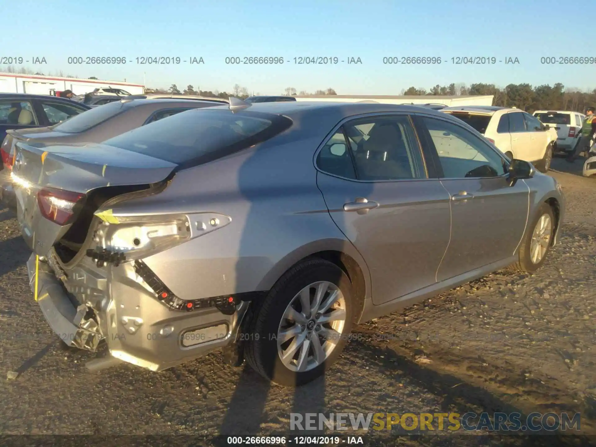 4 Photograph of a damaged car 4T1B11HK0KU816733 TOYOTA CAMRY 2019