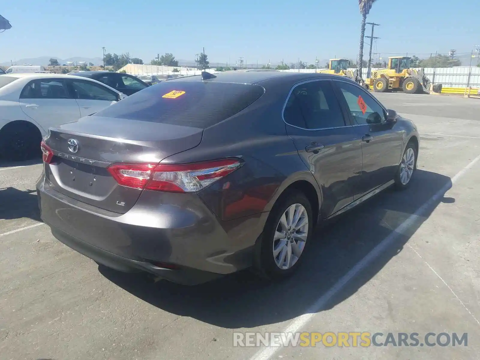 4 Photograph of a damaged car 4T1B11HK0KU818692 TOYOTA CAMRY 2019