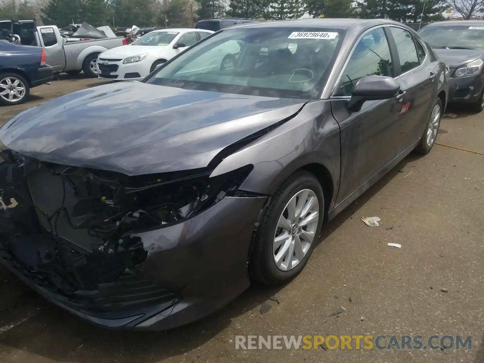 2 Photograph of a damaged car 4T1B11HK0KU819423 TOYOTA CAMRY 2019