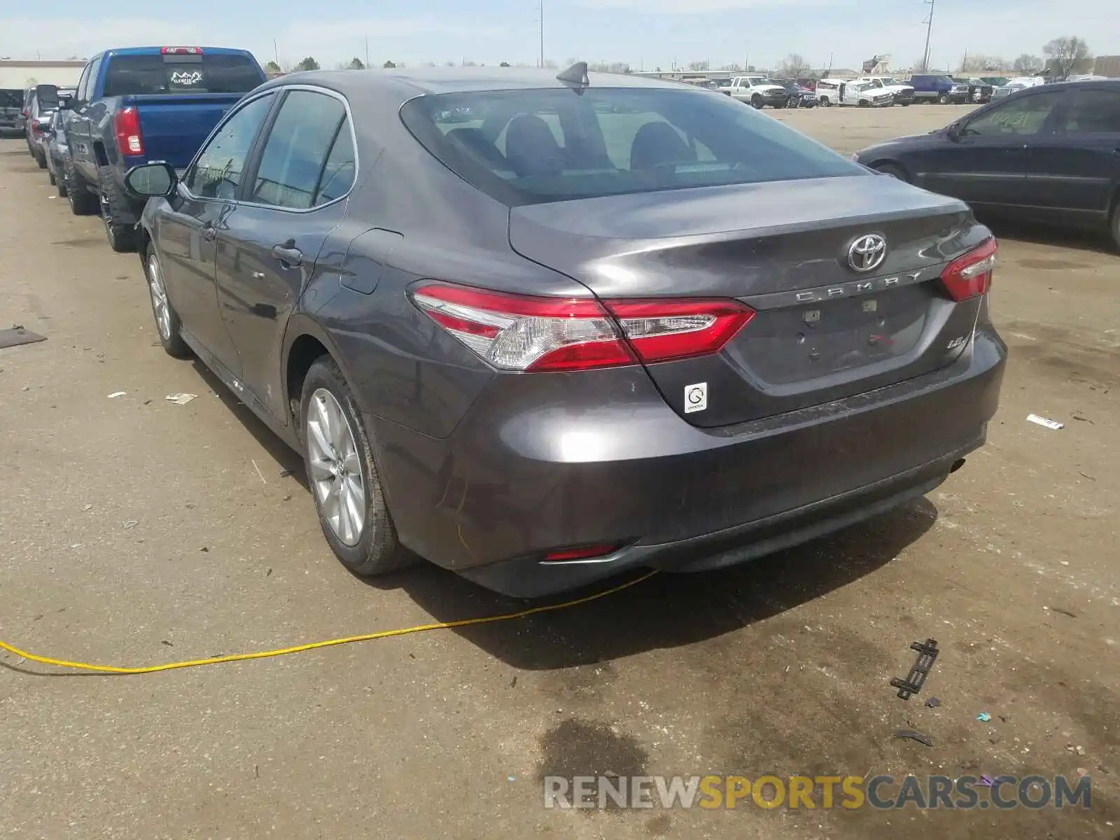 3 Photograph of a damaged car 4T1B11HK0KU819423 TOYOTA CAMRY 2019