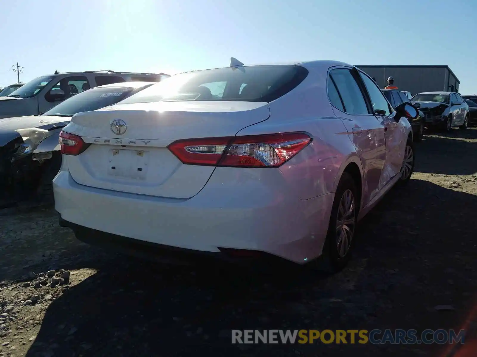 4 Photograph of a damaged car 4T1B11HK0KU820572 TOYOTA CAMRY 2019