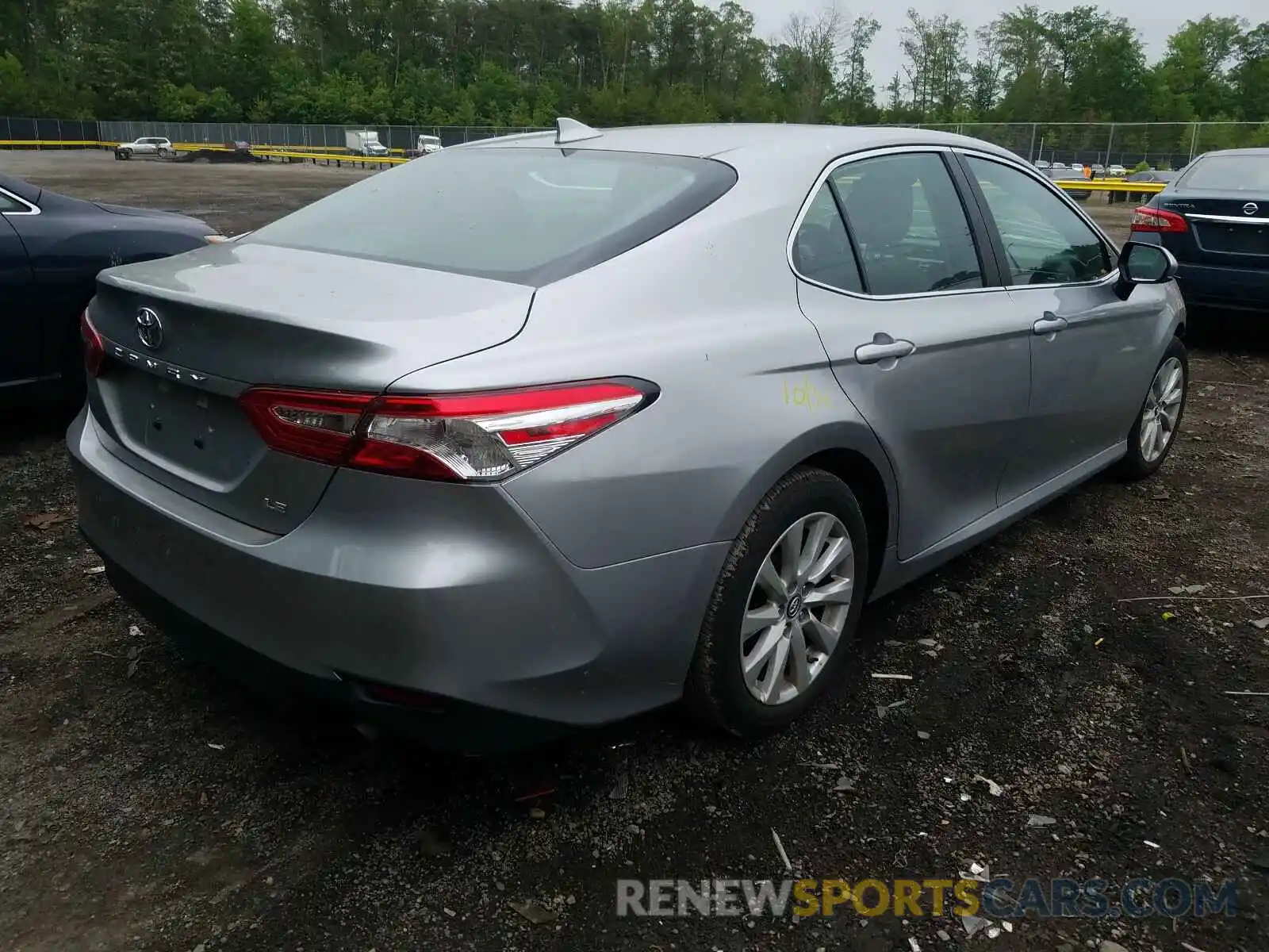 4 Photograph of a damaged car 4T1B11HK0KU820846 TOYOTA CAMRY 2019