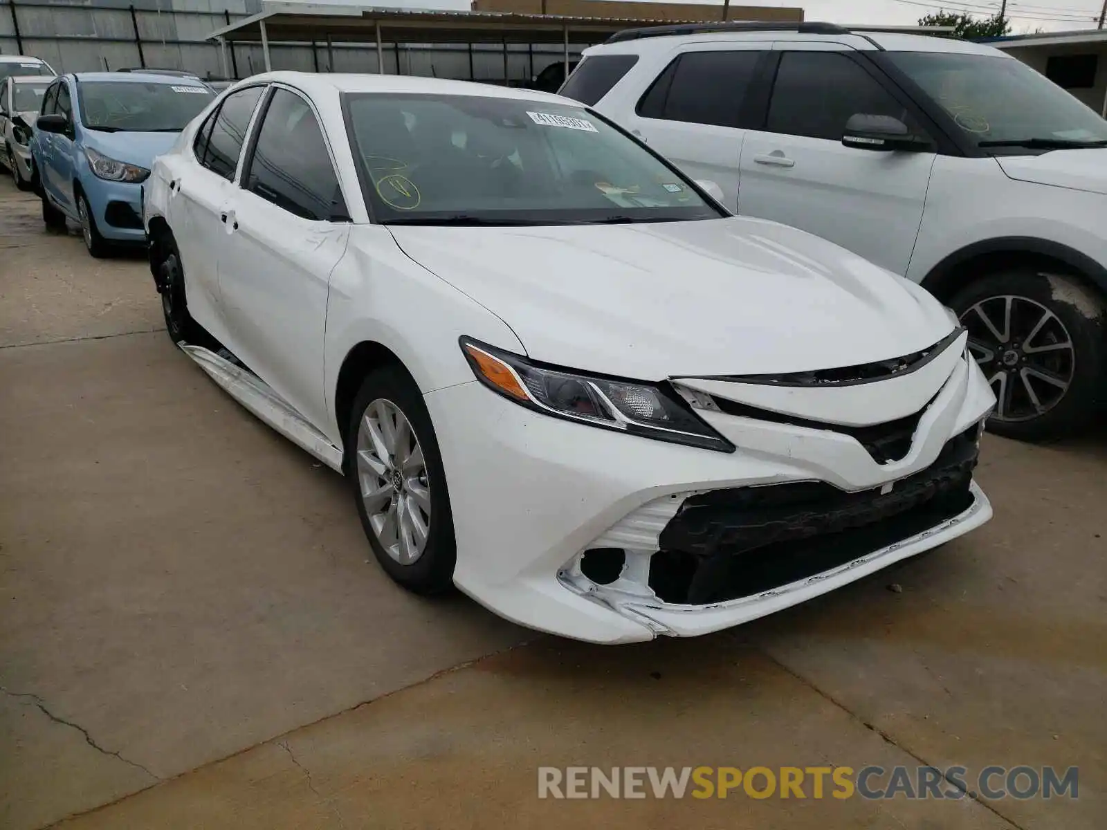 1 Photograph of a damaged car 4T1B11HK0KU823374 TOYOTA CAMRY 2019