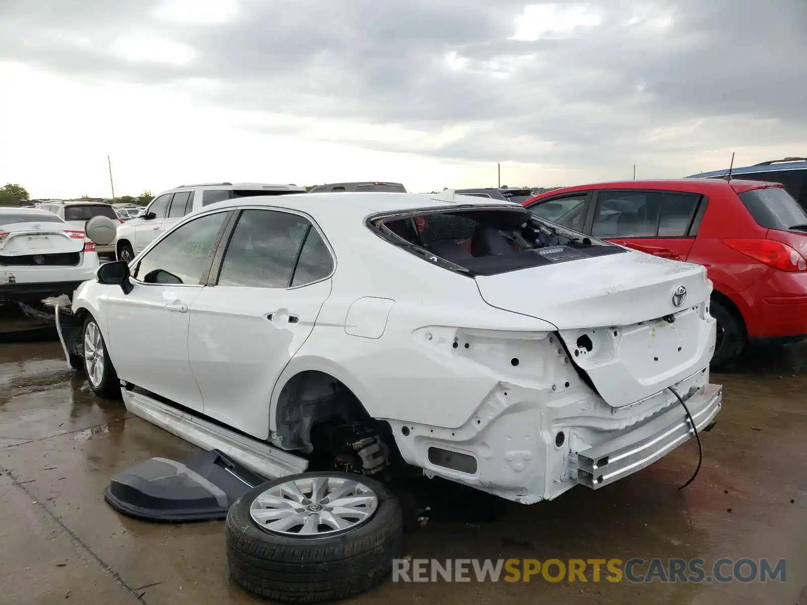 3 Photograph of a damaged car 4T1B11HK0KU823374 TOYOTA CAMRY 2019