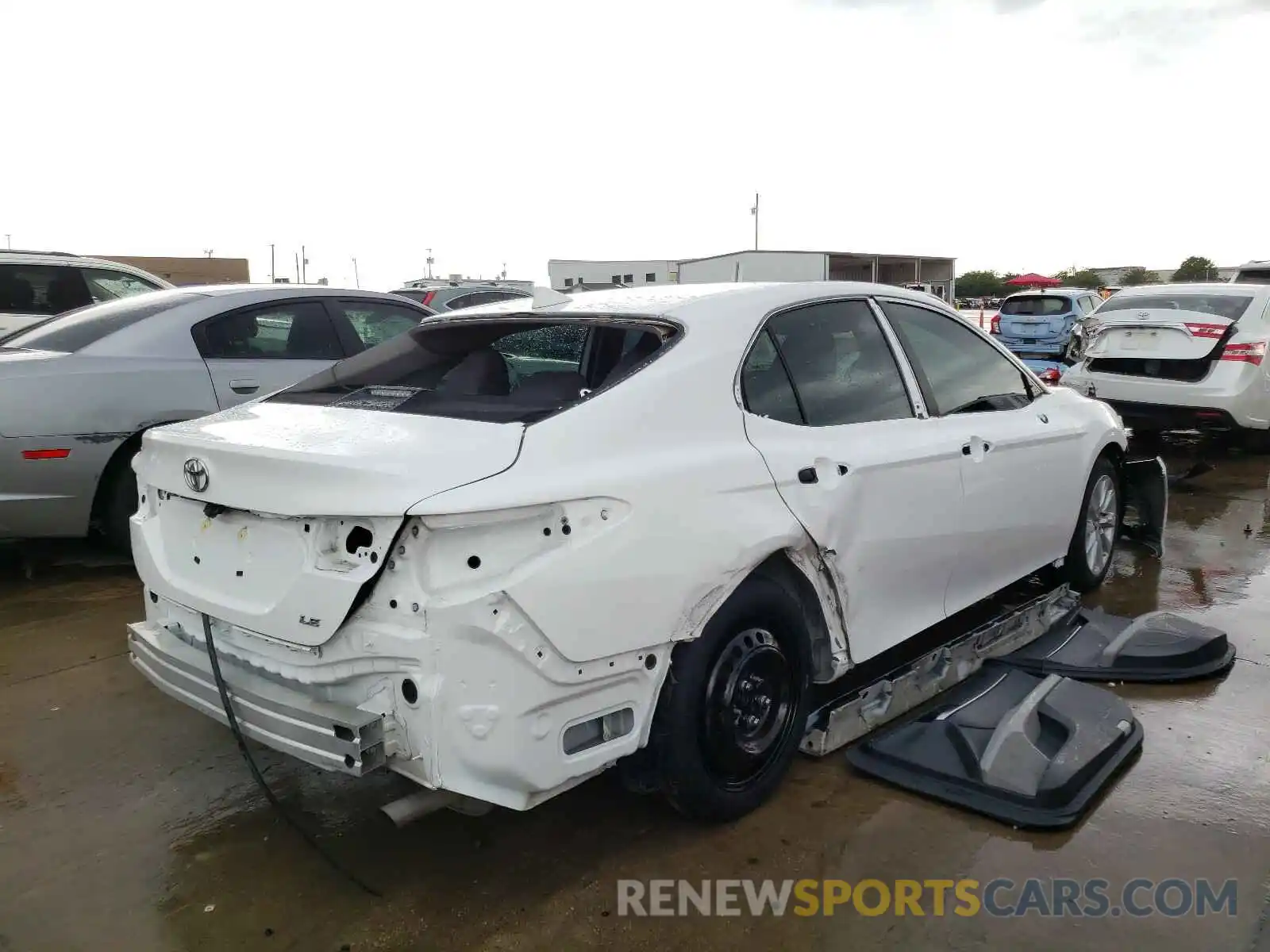 4 Photograph of a damaged car 4T1B11HK0KU823374 TOYOTA CAMRY 2019