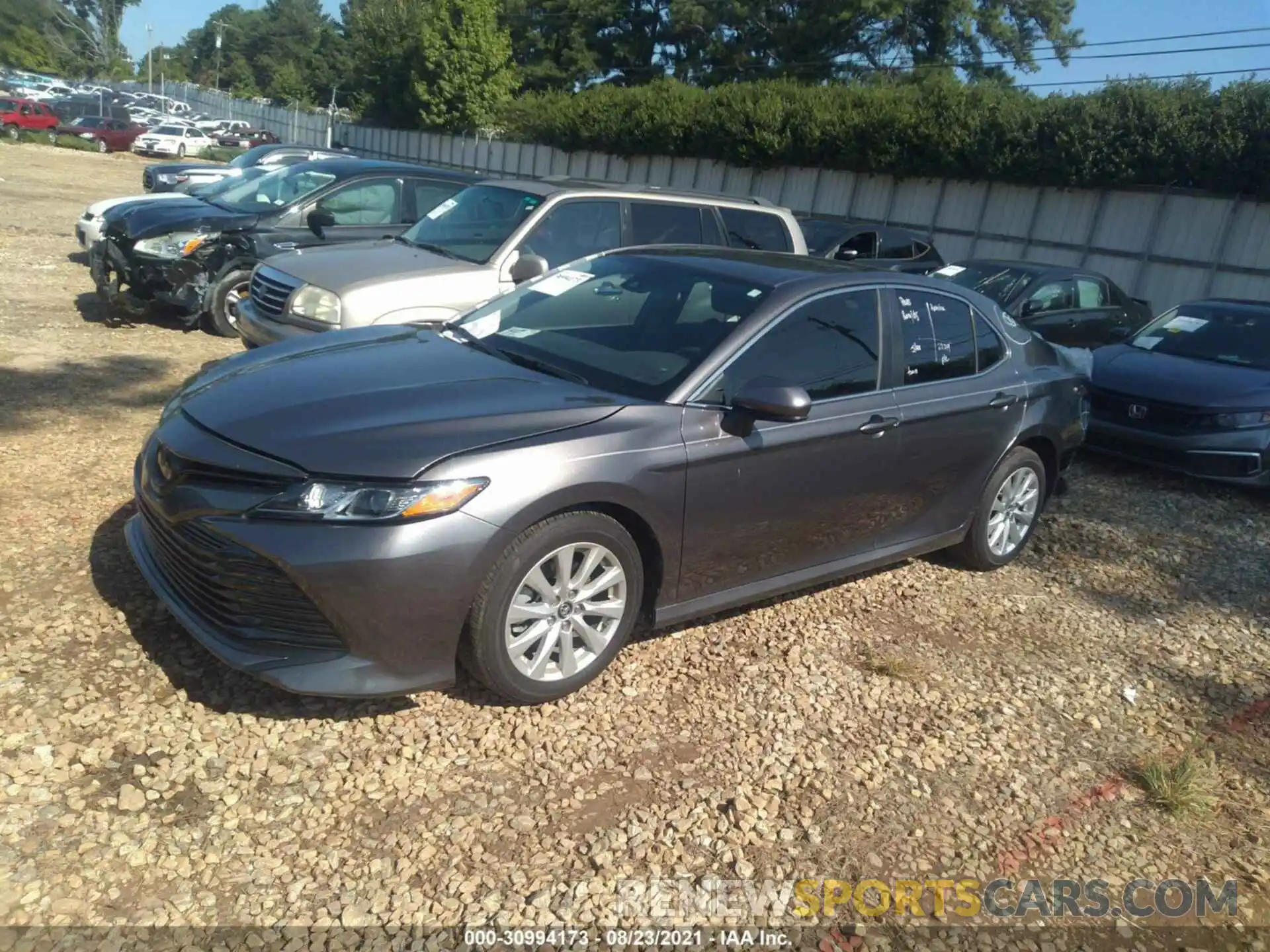 2 Photograph of a damaged car 4T1B11HK0KU823794 TOYOTA CAMRY 2019