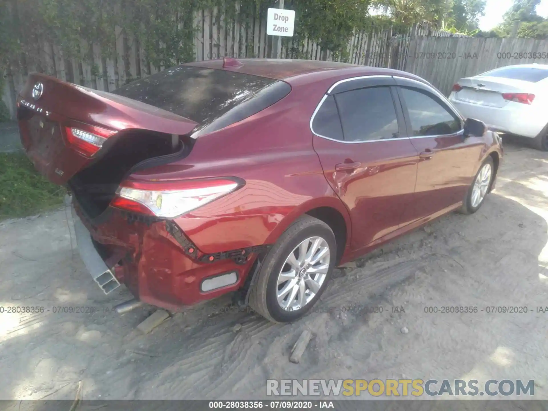 4 Photograph of a damaged car 4T1B11HK0KU824203 TOYOTA CAMRY 2019