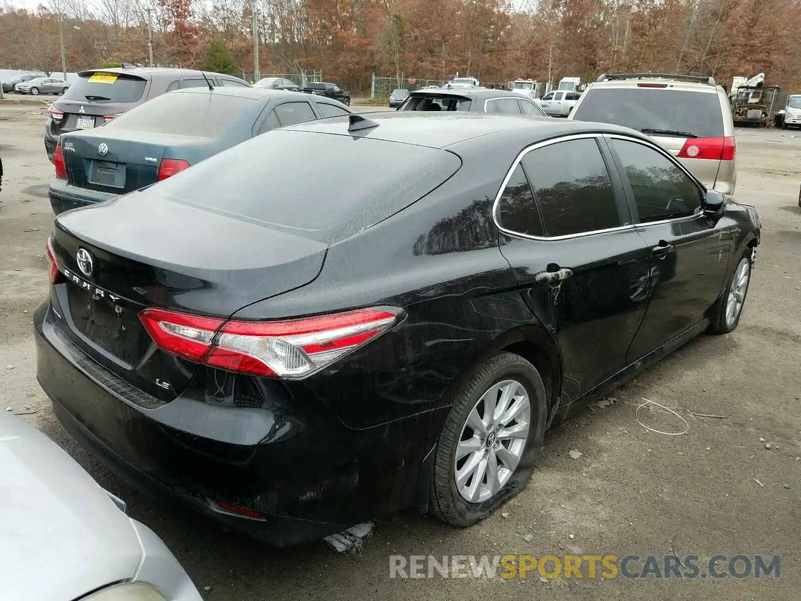 4 Photograph of a damaged car 4T1B11HK0KU825397 TOYOTA CAMRY 2019