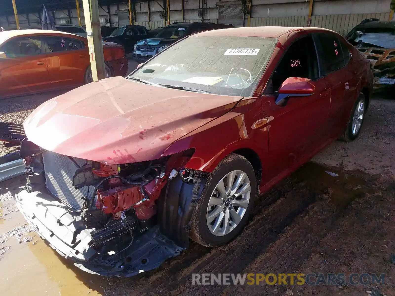 2 Photograph of a damaged car 4T1B11HK0KU825867 TOYOTA CAMRY 2019