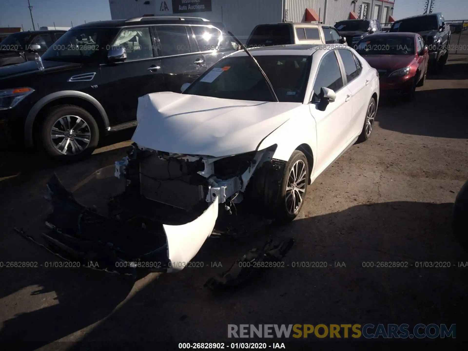 2 Photograph of a damaged car 4T1B11HK0KU828140 TOYOTA CAMRY 2019