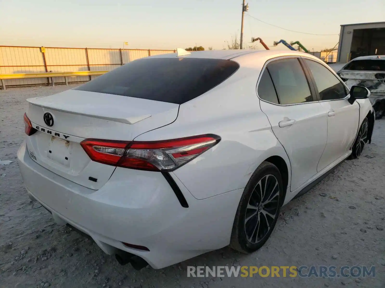 4 Photograph of a damaged car 4T1B11HK0KU829109 TOYOTA CAMRY 2019